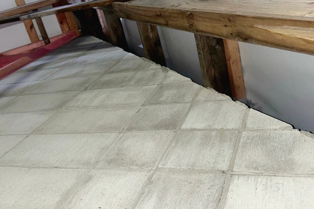 Unsealed head-of-wall gap in a fire-rated block wall